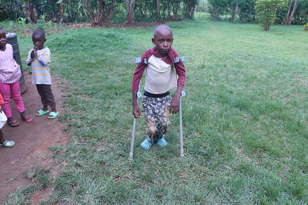 Peter Okoth receiving help